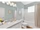 Bathroom with a bathtub, toilet and vanity at 33936 Highland Rd, Leesburg, FL 34788
