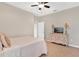 Bedroom with a queen-size bed and dresser at 33936 Highland Rd, Leesburg, FL 34788