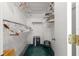 Large walk-in closet with ample hanging space and shelving at 9823 Se 178Th Ln, Summerfield, FL 34491