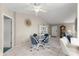 Charming dining area with a table and four chairs, near the entryway at 9823 Se 178Th Ln, Summerfield, FL 34491