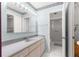Clean bathroom with a vanity, sink, and shower at 9823 Se 178Th Ln, Summerfield, FL 34491