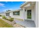 House exterior with green door and walkway at 9823 Se 178Th Ln, Summerfield, FL 34491