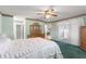 Main bedroom with sliding glass doors leading to a patio at 9823 Se 178Th Ln, Summerfield, FL 34491