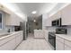 Modern kitchen with stainless steel appliances and light wood cabinets at 9823 Se 178Th Ln, Summerfield, FL 34491
