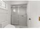 Simple bathroom with toilet and shower at 9823 Se 178Th Ln, Summerfield, FL 34491