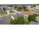 Aerial view of house and surrounding neighborhood at 17913 Se 88Th Cascade Ct, The Villages, FL 32162