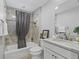 Clean bathroom with a tub, shower, and updated vanity at 3162 Webster Way, The Villages, FL 32163