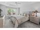 Bright bedroom with a comfortable bed and plenty of natural light at 3162 Webster Way, The Villages, FL 32163
