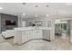 Open concept kitchen with large island and breakfast nook at 3162 Webster Way, The Villages, FL 32163
