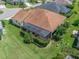 Aerial view showcasing home's backyard and screened patio at 3162 Webster Way, The Villages, FL 32163