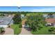 Property view showing house, landscaping, and surrounding neighborhood at 1213 El Esparza Ln, The Villages, FL 32159