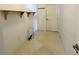 Small storage room with shelves and extra space at 1213 El Esparza Ln, The Villages, FL 32159