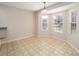 Charming breakfast nook with three windows and a tile floor at 306 Bishopville Loop # 117, The Villages, FL 32162