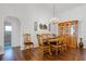 Dining room with hardwood floors, a wood hutch, and a chandelier at 6401 Tildon, Leesburg, FL 34748