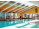 Relaxing indoor pool with skylights and comfortable seating at 6401 Tildon, Leesburg, FL 34748