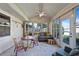 Bright sunroom with ample seating and views of the backyard at 6401 Tildon, Leesburg, FL 34748