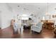 Open living space with hardwood floors, kitchen, and dining area at 6401 Tildon, Leesburg, FL 34748