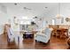 Open living space with hardwood floors, kitchen, and dining area at 6401 Tildon, Leesburg, FL 34748