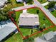 Single-story home with a large backyard, highlighted by a red border at 6401 Tildon, Leesburg, FL 34748