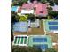 Aerial view of community amenities including pool, tennis courts, and shuffleboard at 6401 Tildon, Leesburg, FL 34748