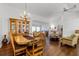 Bright dining room features hardwood floors, a chandelier, and a built-in hutch at 6401 Tildon, Leesburg, FL 34748