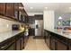 Kitchen with stainless steel appliances and granite countertops at 2019 Majorca Dr, Kissimmee, FL 34747