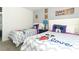Mickey Mouse themed bedroom with twin beds at 2019 Majorca Dr, Kissimmee, FL 34747