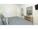 Spacious bedroom with a dresser and en-suite bathroom access at 2019 Majorca Dr, Kissimmee, FL 34747