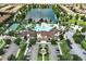 Resort-style pool and clubhouse with expansive deck and lake views at 2019 Majorca Dr, Kissimmee, FL 34747