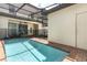 Private pool with patio and covered seating area at 2019 Majorca Dr, Kissimmee, FL 34747