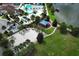 Relaxing community park with playground, shaded seating, and sand volleyball court at 2019 Majorca Dr, Kissimmee, FL 34747