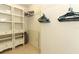 Spacious walk-in closet with shelving and hanging rods at 2019 Majorca Dr, Kissimmee, FL 34747