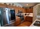 Modern kitchen featuring stainless steel appliances and wood cabinets at 16360 Sw 15Th Ct, Ocala, FL 34473