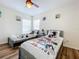 bedroom with two twin beds and Mickey Mouse bedding at 426 Orange Cosmos Blvd, Davenport, FL 33837