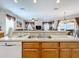 Kitchen island with double sink, overlooking living room at 426 Orange Cosmos Blvd, Davenport, FL 33837