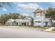 Community center showcasing architectural details and landscaping at 10619 Grand Oaks Blvd, Oxford, FL 34484
