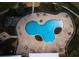 Community pool and surrounding patio, viewed from above at 10619 Grand Oaks Blvd, Oxford, FL 34484