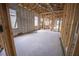 Under construction home with open floor plan and concrete flooring at 10619 Grand Oaks Blvd, Oxford, FL 34484