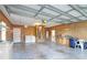 Garage with workshop area, washer and dryer hookups at 21701 Queen Mary Ct, Leesburg, FL 34748