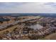 Community overview showcasing houses, a lake, and roads at 15300 Sw 14Th Avenue Rd, Ocala, FL 34473