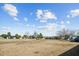 Open backyard view with homes and trees in the background at 15300 Sw 14Th Avenue Rd, Ocala, FL 34473