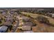 Aerial view of houses and road in a residential area at 15300 Sw 14Th Avenue Rd, Ocala, FL 34473