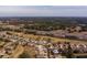 Aerial view of community by highway and golf course at 15300 Sw 14Th Avenue Rd, Ocala, FL 34473