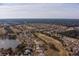 Community overview with various houses, a lake and golf course at 15300 Sw 14Th Avenue Rd, Ocala, FL 34473