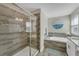 Bathroom with a walk-in shower and soaking tub at 1592 Flange Dr, Davenport, FL 33896