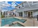 Private pool and spa with spacious patio at 1592 Flange Dr, Davenport, FL 33896