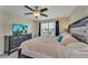 Main bedroom with king bed and dresser at 1592 Flange Dr, Davenport, FL 33896