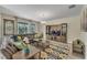 Spacious living room with sectional sofa and large TV at 1592 Flange Dr, Davenport, FL 33896