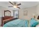Bedroom with a queen bed and ceiling fan at 1592 Flange Dr, Davenport, FL 33896
