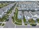 Aerial view of a residential neighborhood with houses and streets at 1592 Flange Dr, Davenport, FL 33896